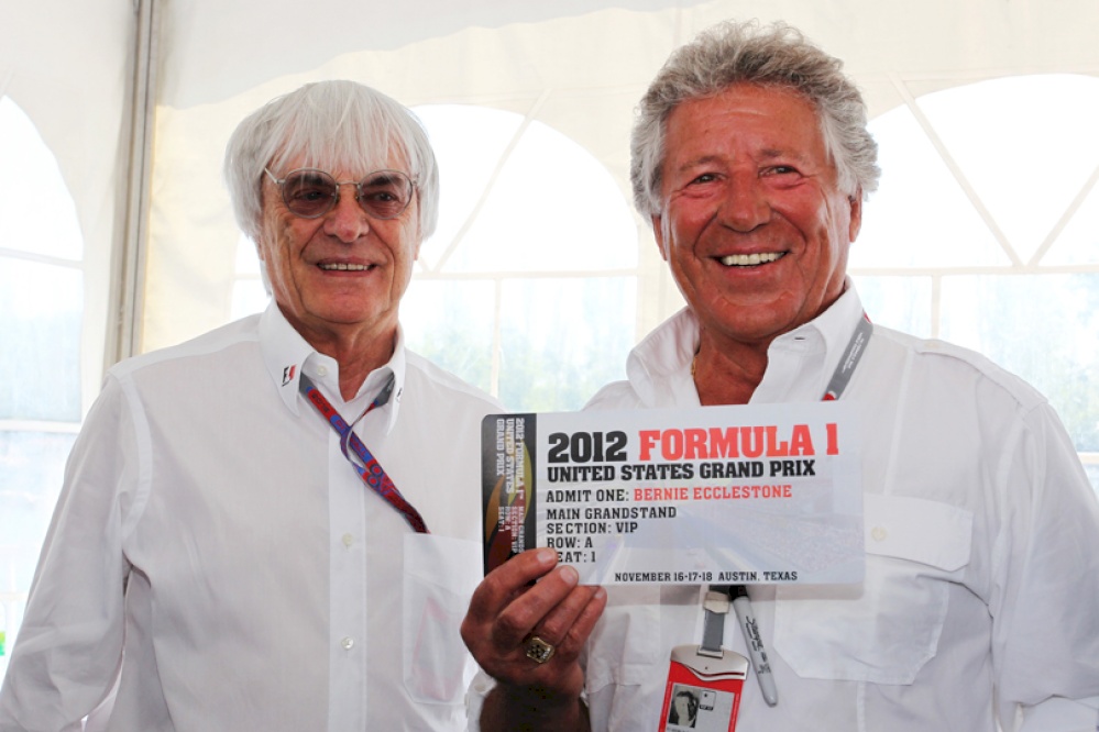 1000_4fd51943e0a89Bernie-Ecclestone-&-Mario-Andretti-with-F1USGP-Ticket.jpg